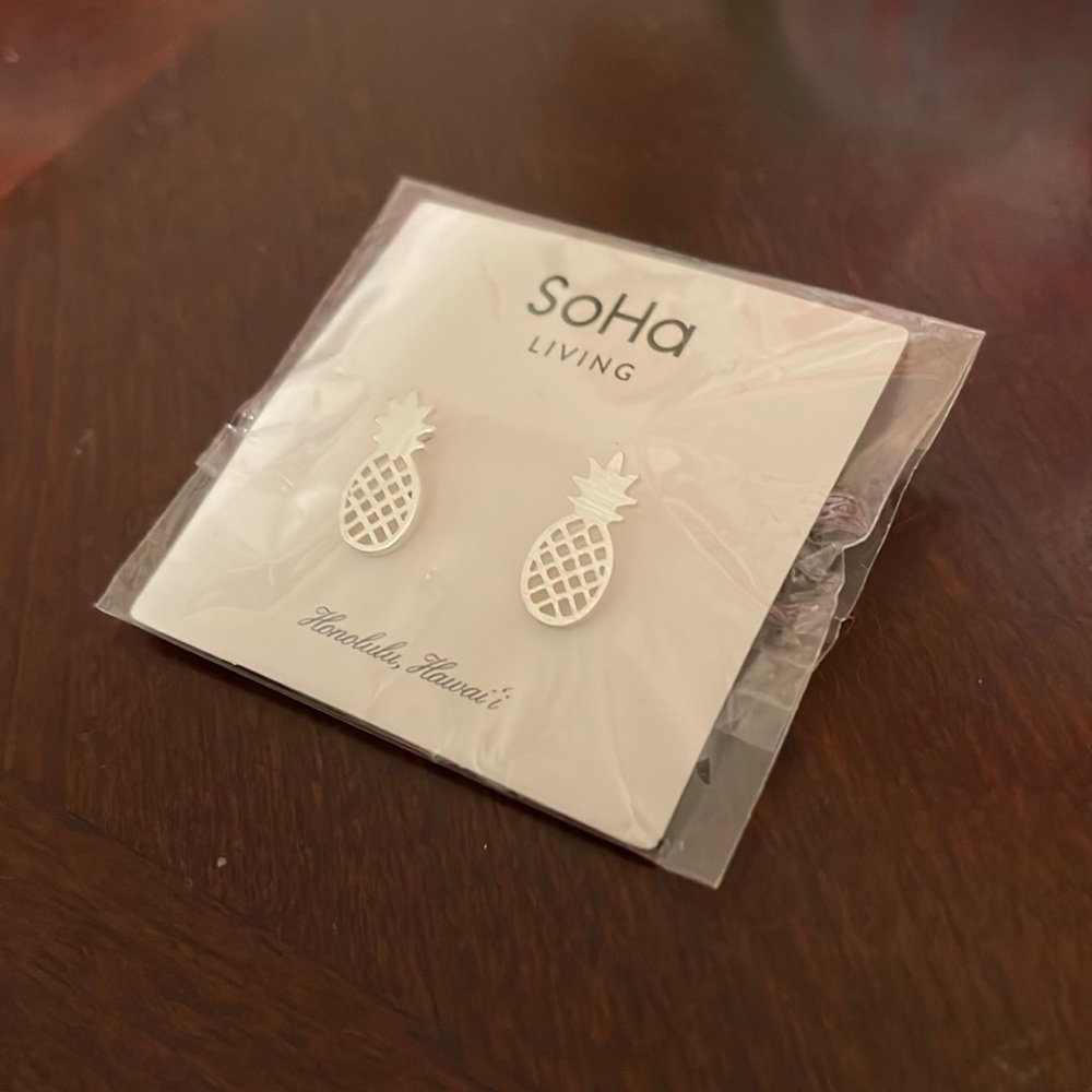 Never been worn silver Pineapple studs